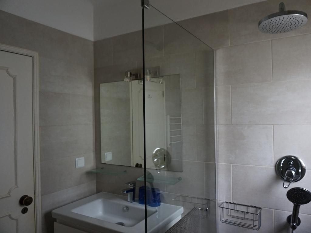 Bathroom 1 apartment in Lagos: walk-in shower and sink